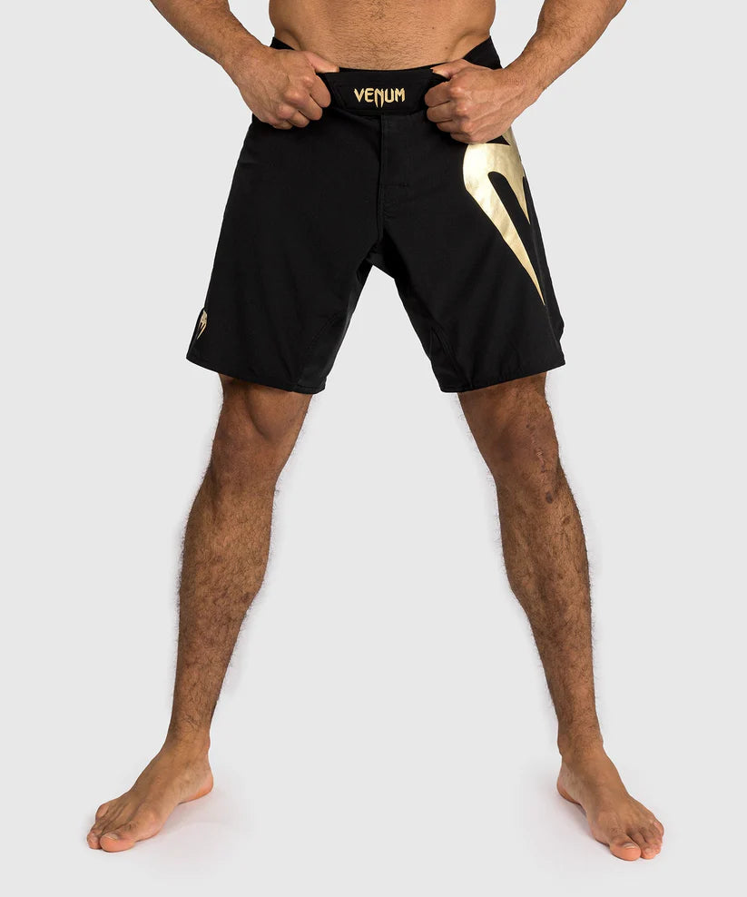 Venum Light 5.0 Fight Shorts - Black/Gold Image 1
