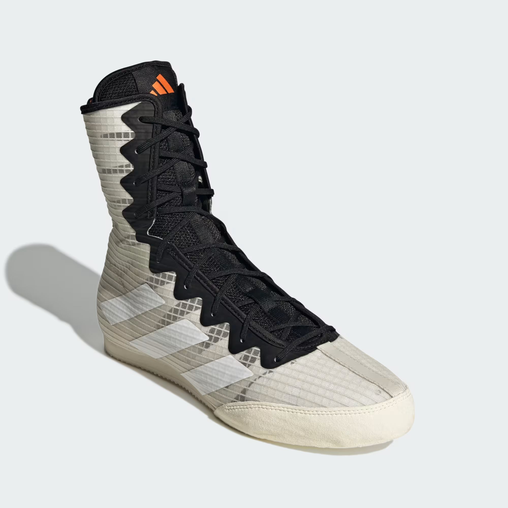 Angled action view highlighting footwork support and stability grey