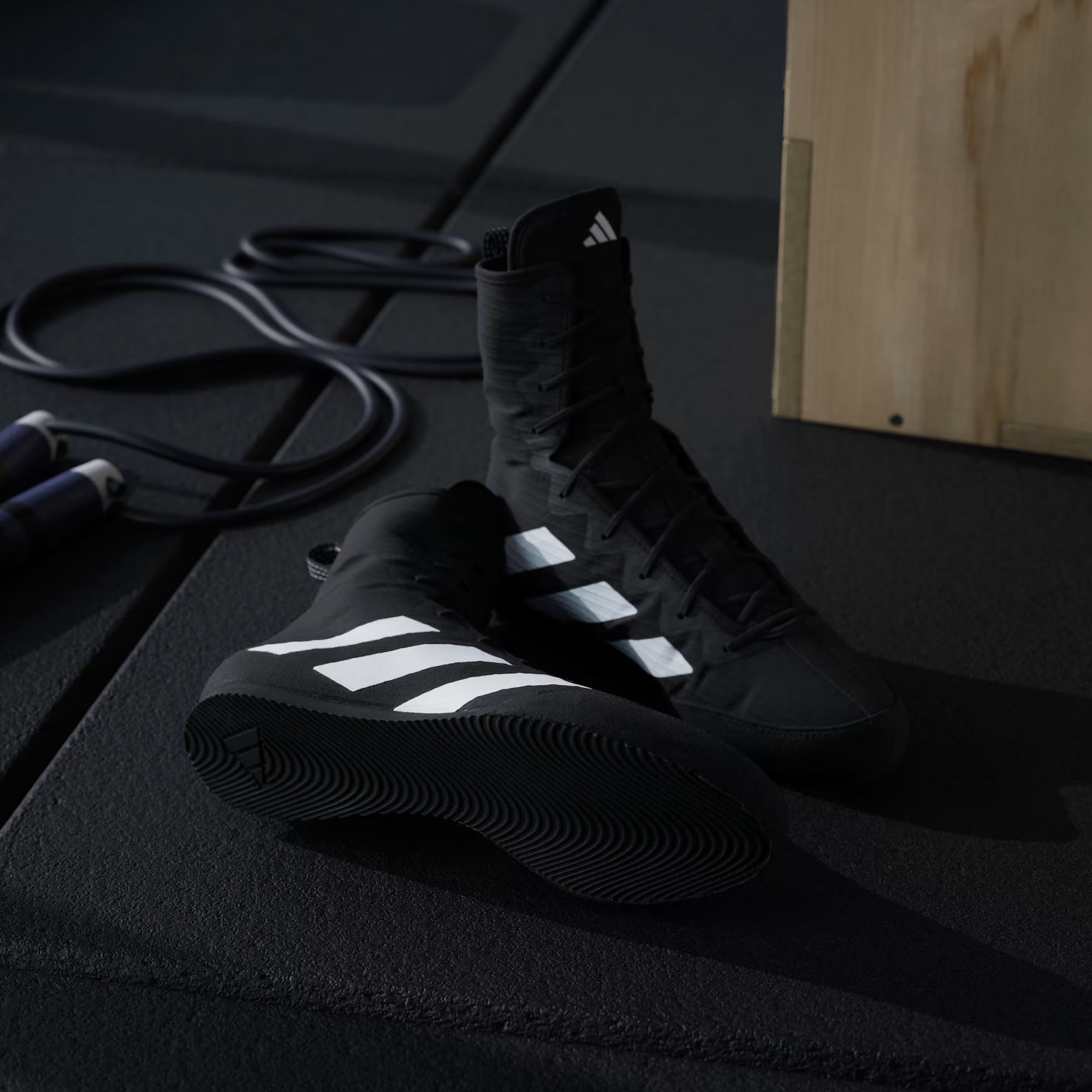 Angled view showing structure and support of adidas boxing shoes