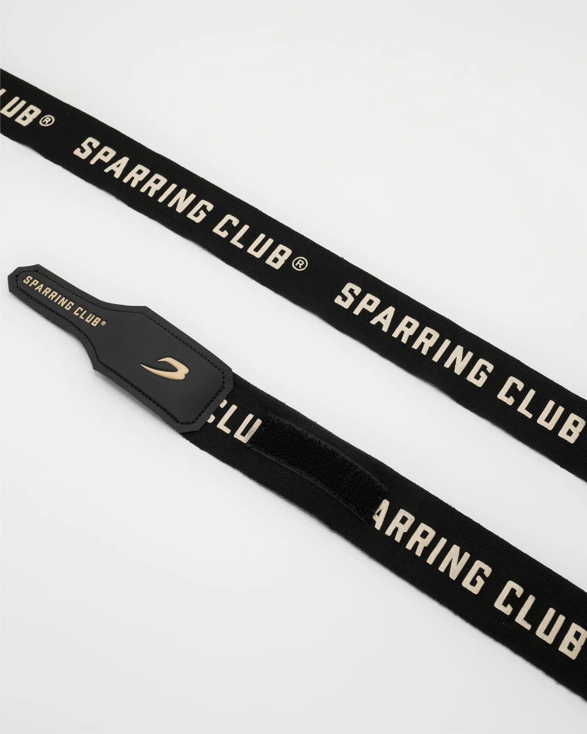 Rolled Boxraw 4.5m Sparring Club Hand Wraps Black Gold showing compact wrap design