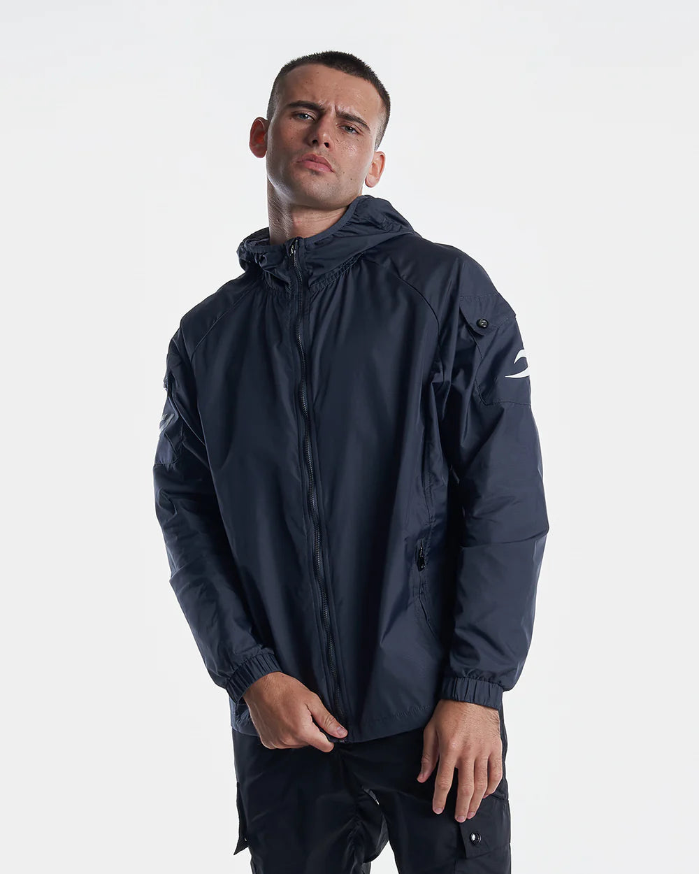 Close-up of Boxraw Dundee Windbreaker Jacket Charcoal hood and hidden chest pocket detail