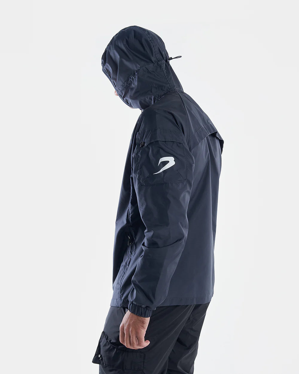 Sleeve cargo pocket and embroidered Strike logo on Boxraw Dundee Windbreaker Jacket Charcoal