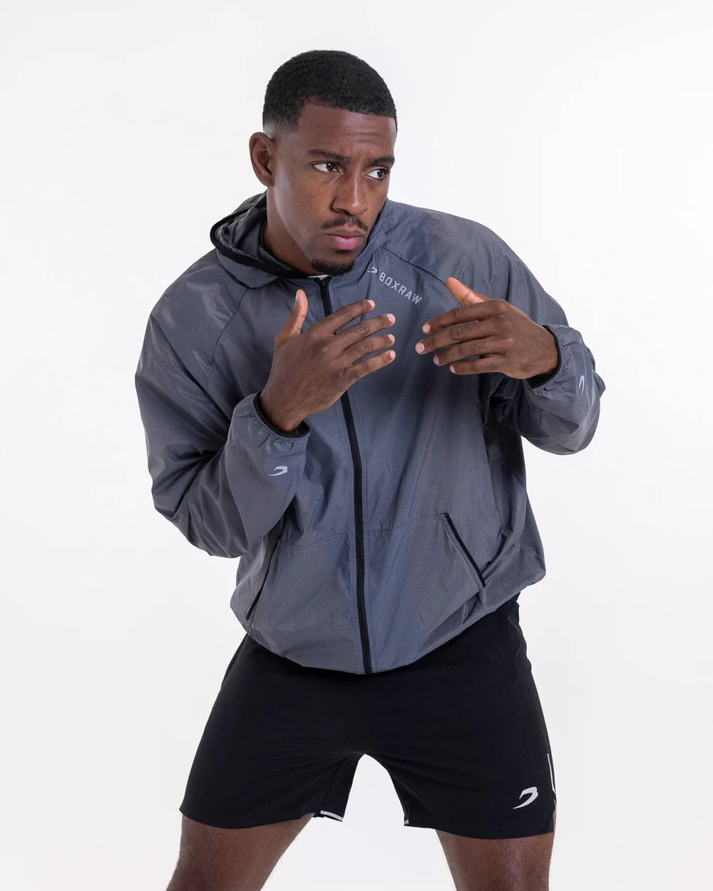 Zip-up front and elasticated hood detail on Boxraw Genaro Zip Up Windbreaker Charcoal