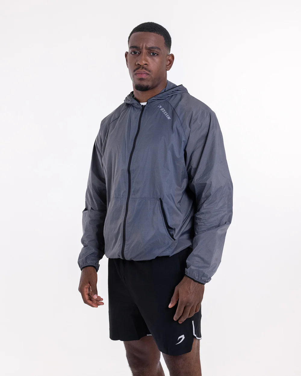 Side view of Boxraw Genaro Zip Up Windbreaker Charcoal showing relaxed fit