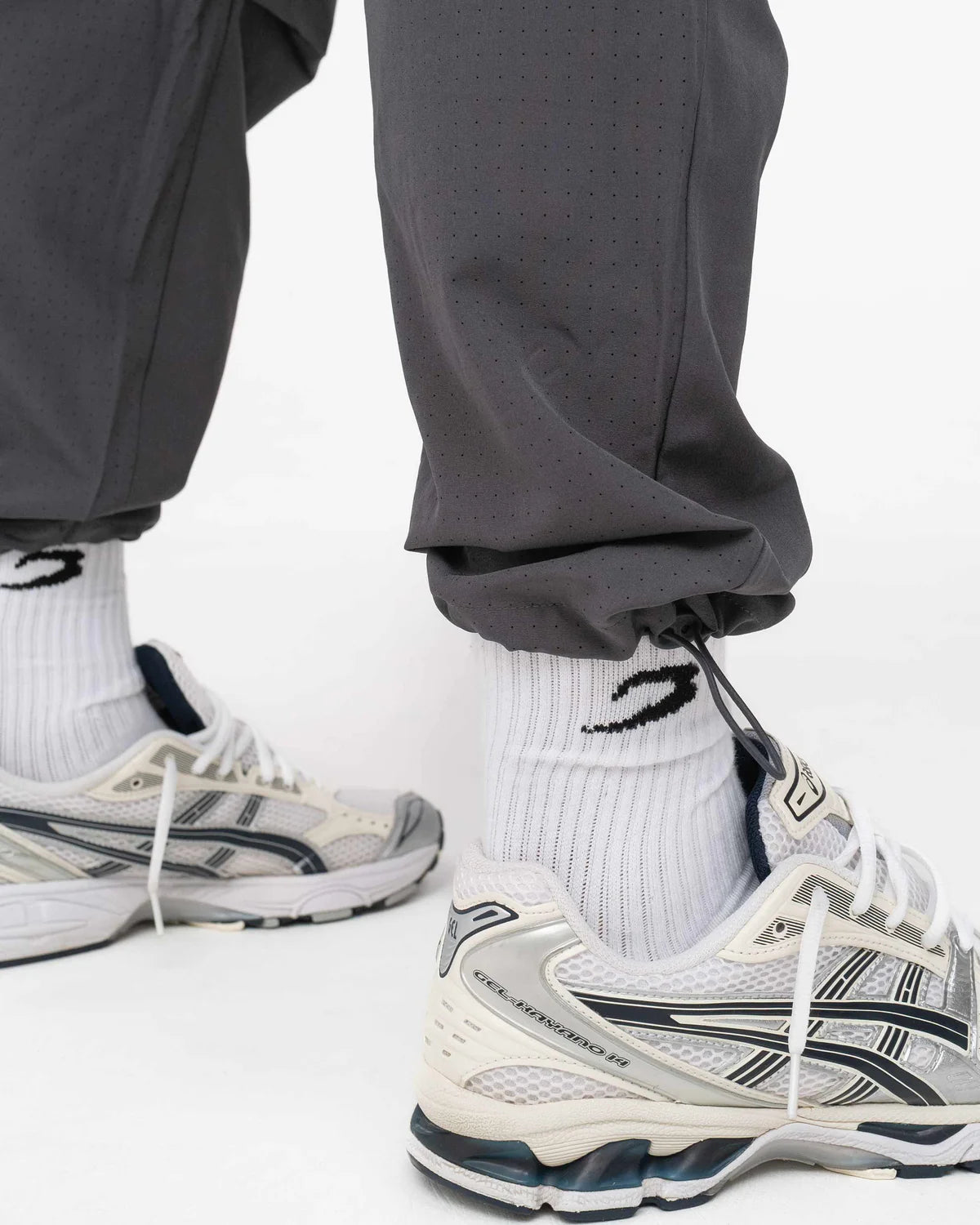 Adjustable elasticated ankle cuff detail on Boxraw Tunero Track Bottoms Charcoal