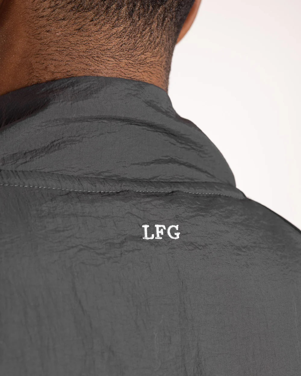 Embroidered LFG and sleeve Strike logo close-up on Boxraw Tunero Track Jacket Grey