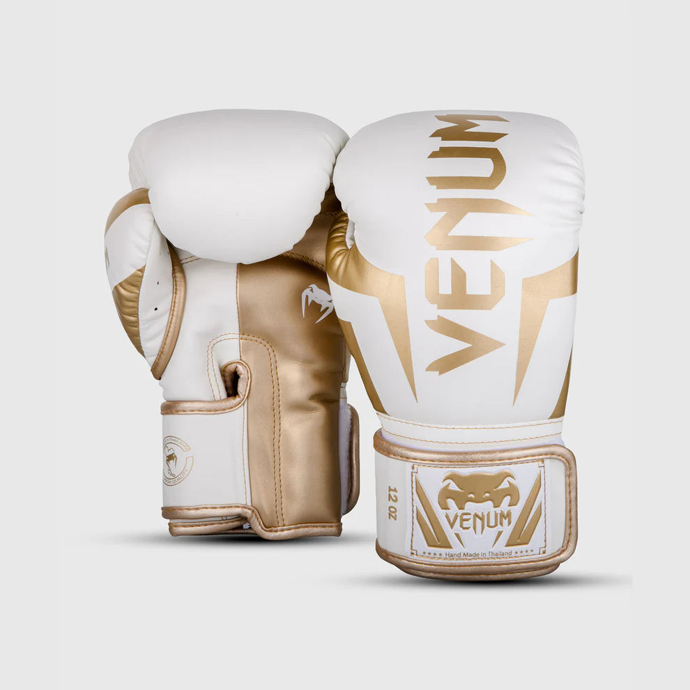 Durable training boxing gloves with triple-density foam for superior shock absorption.
