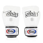 Side view of Fairtex BGV15 white boxing gloves showing contoured padding and double wrist strap.