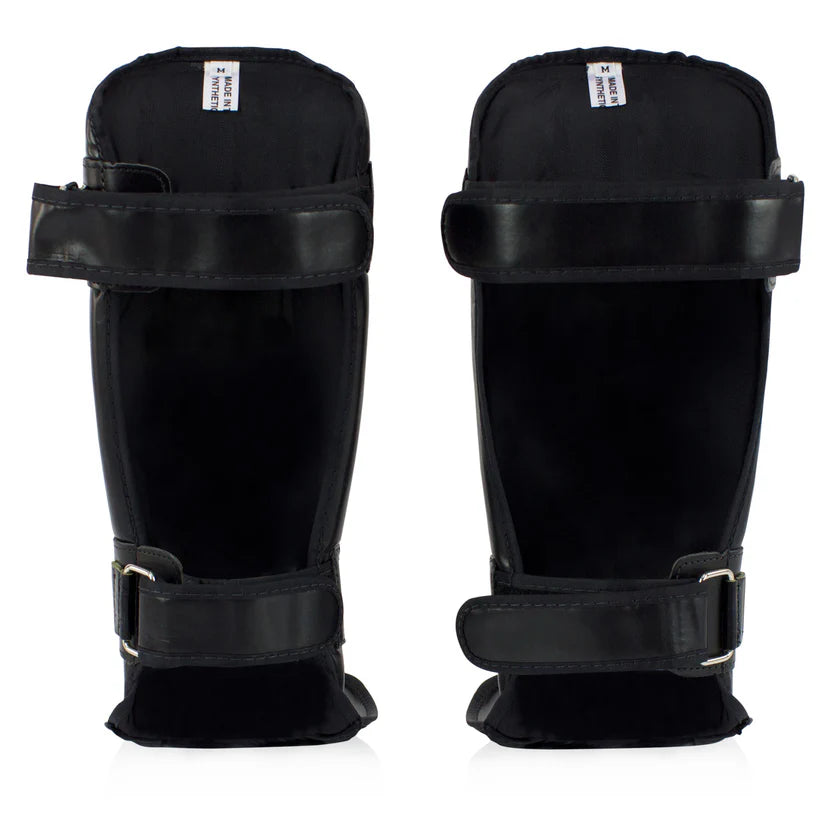 Fairtex MMA shin guards with hook and loop adjustable straps and anti-slip denim lining