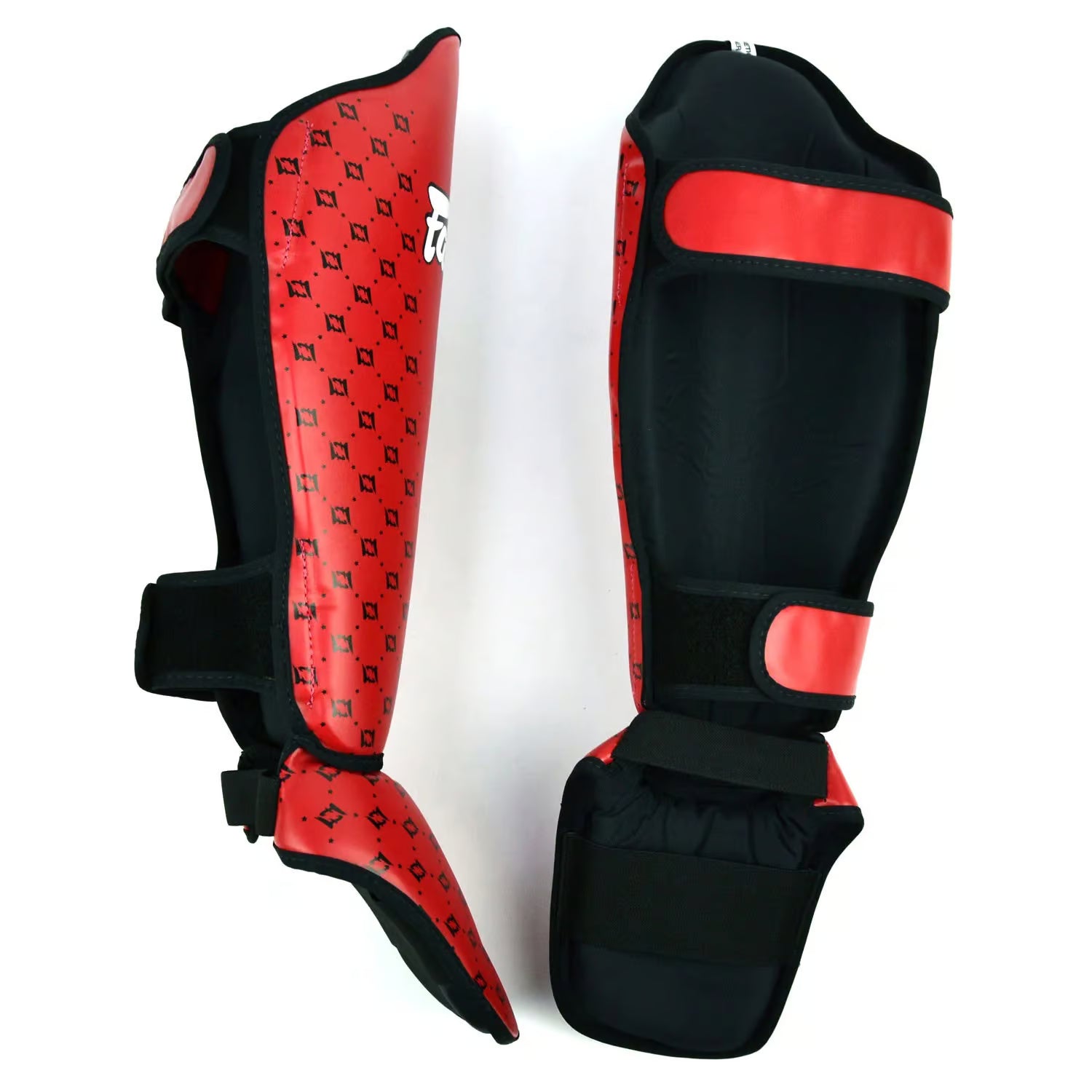 Fairtex red shin guards used in Muay Thai sparring session