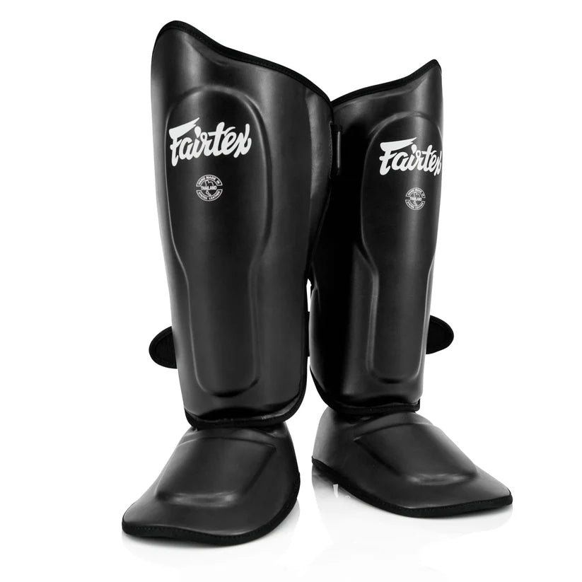Fairtex shin pads with contoured padding for secure fit and superior comfort during training.