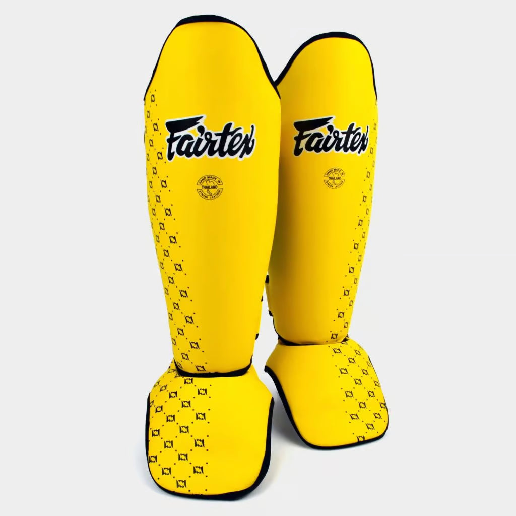 Front view of Fairtex SP5 shin guards showing full shin and foot coverage