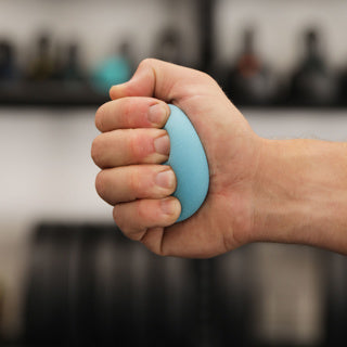 Forearm exercise balls designed to improve grip strength and finger flexibility.