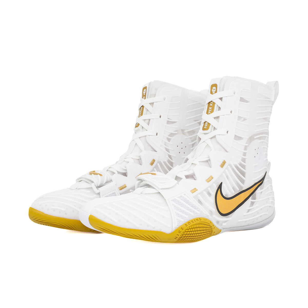 Detailed view of the lacing area and integrated lace garage on White/Gold Nike HyperKO 3 boxing shoes.
