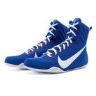 Side view of Nike Machomai 3 boxing shoes in blue and white with sleek athletic silhouette.