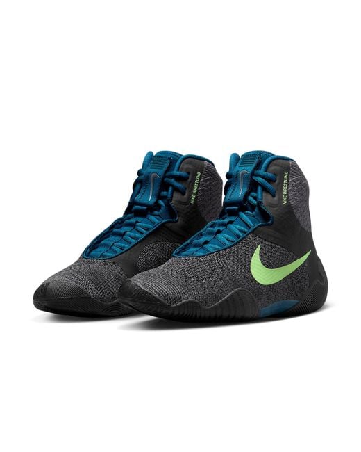 Lateral side view of Nike Tawa wrestling shoes showing traction design