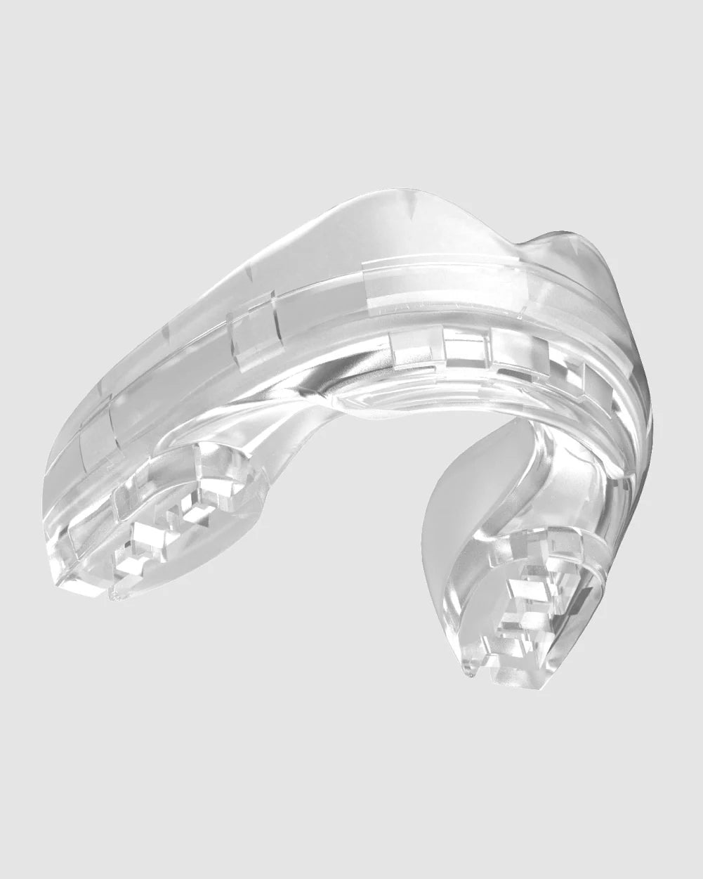 Front view of clear Ortho Series mouthguard for braces featuring transparent protective design and smooth contours.