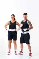 Sting Mettle Black boxing shorts used in ring training, offering lightweight flexibility and professional durability.