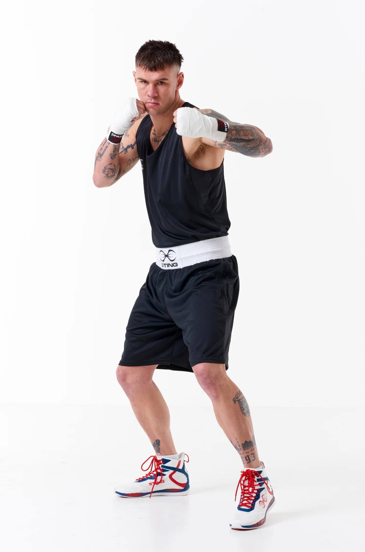 Sting Mettle men’s boxing apparel singlet in Black with breathable fabric.