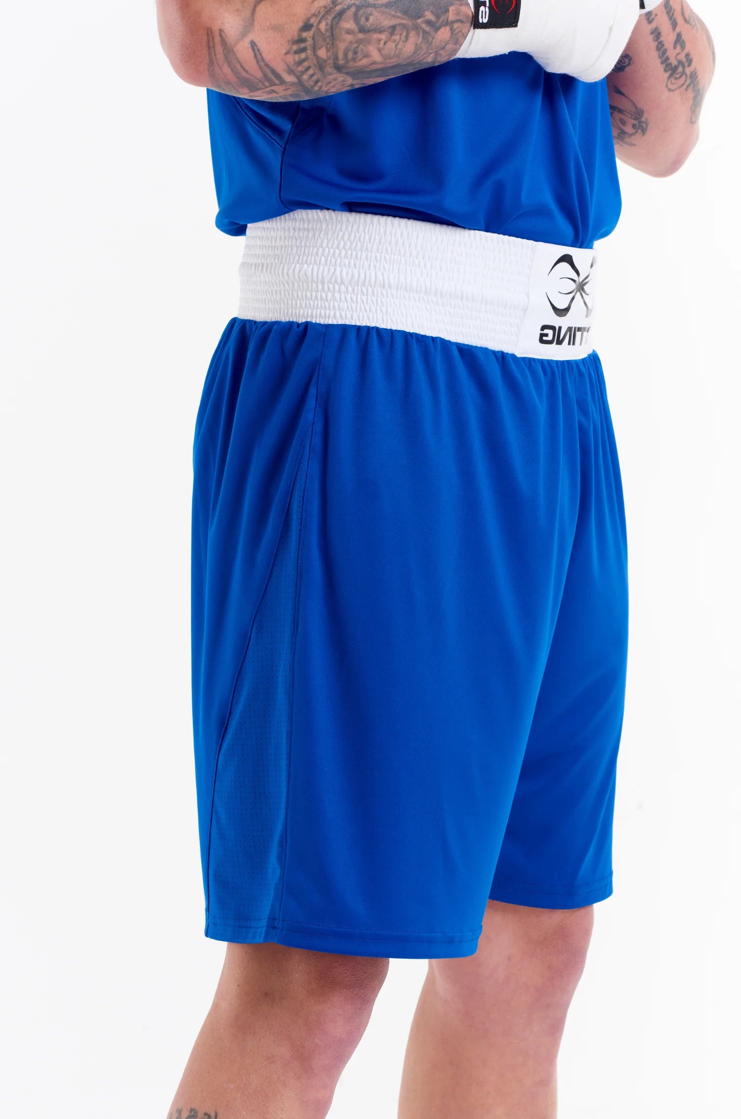 Sting Mettle Blue boxing shorts with extra-wide waistband for a secure fit during training and bouts.