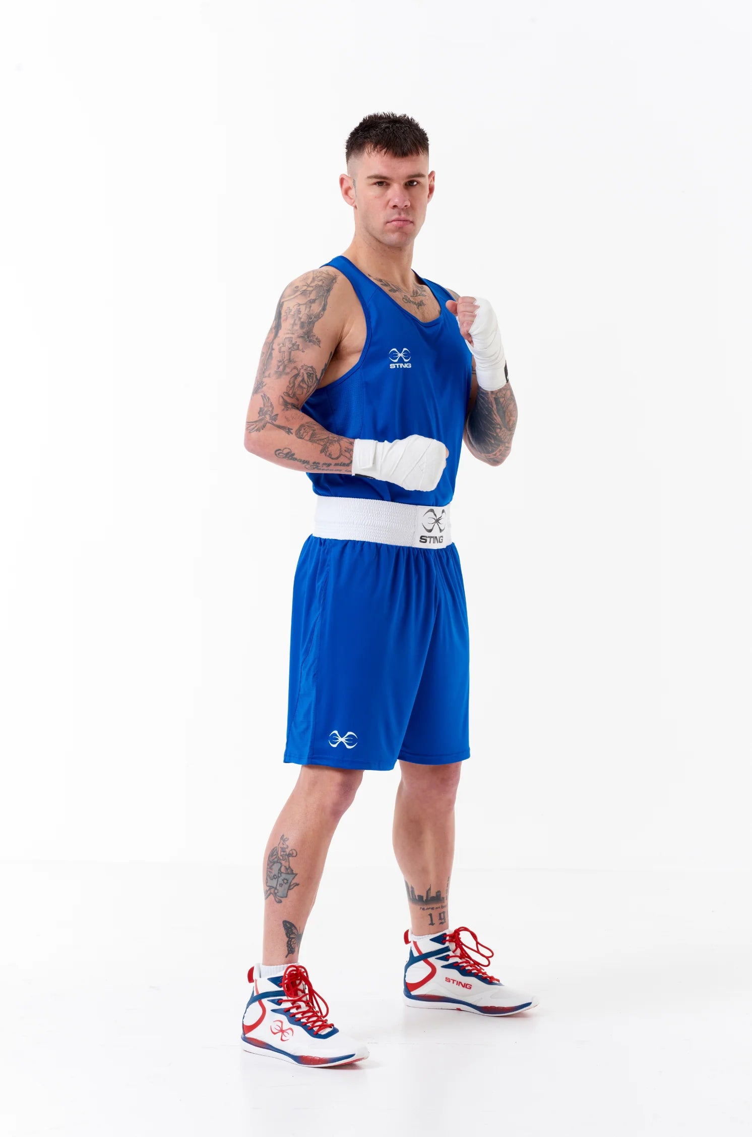 Sting Mettle men’s Blue boxing apparel singlet with breathable climate control fabric.