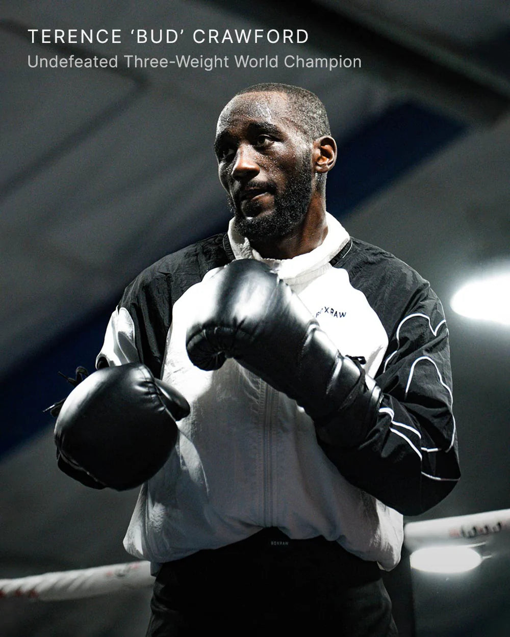 Terence Bud Crawford wearing the Boxraw Tunero Track Jacket in a boxing lifestyle setting