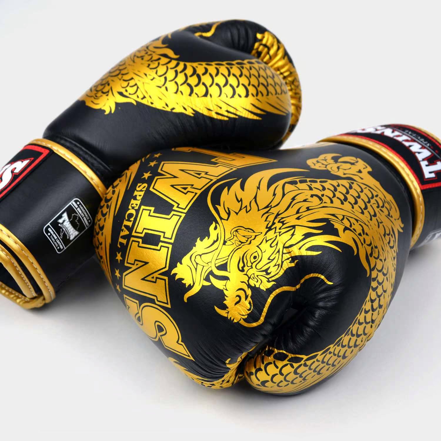Side profile of Twins BGVL4 Dragon boxing gloves showing streamlined shape