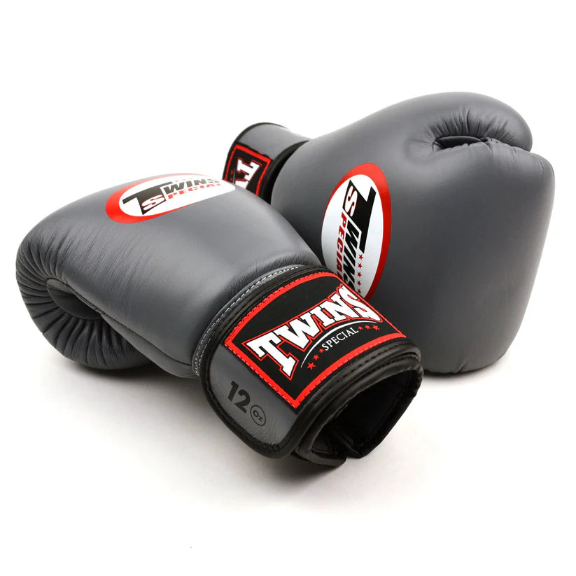 Twins Special BGVL4 Grey sparring gloves with streamlined padding and secure Velcro strap.