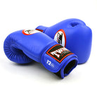 Twins Special BGVL4 Thai leather sparring gloves with streamlined padding and secure Velcro strap.