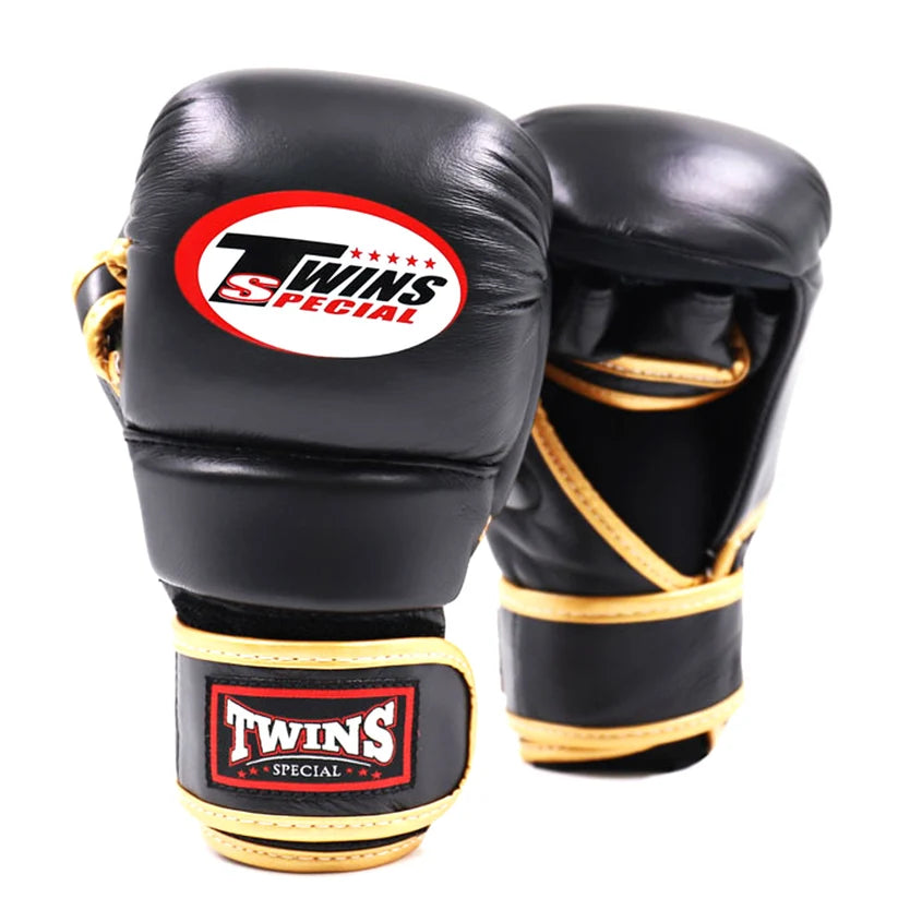 Open palm view of Twins Special GGL14 Black Gold MMA gloves for grappling and clinch work