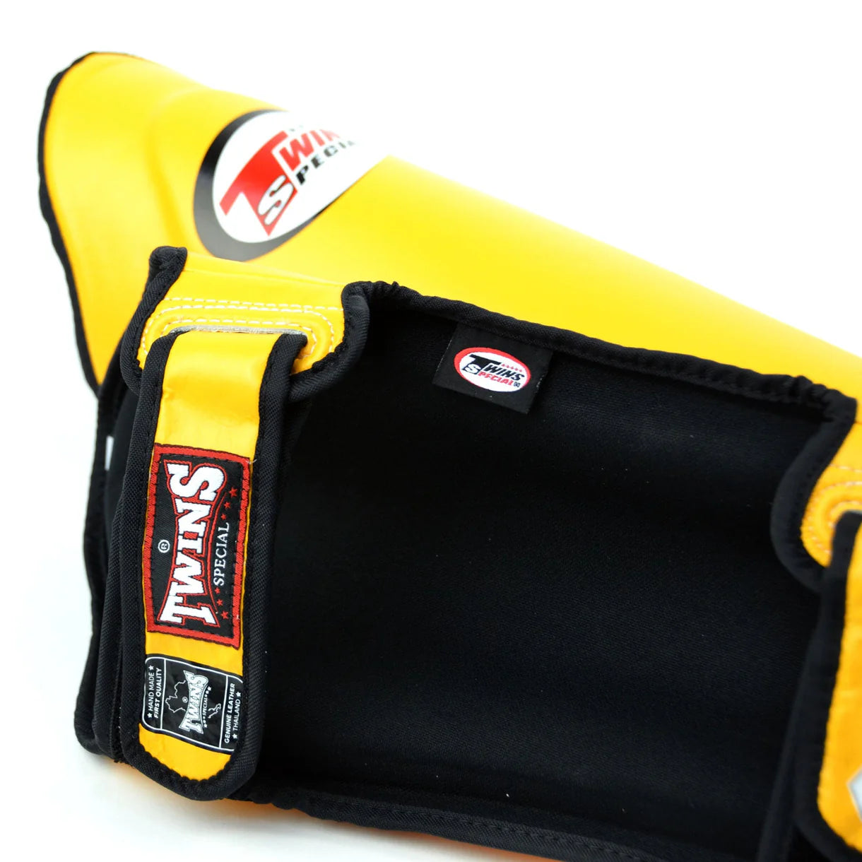 Twins yellow shin guards used during Muay Thai sparring Training