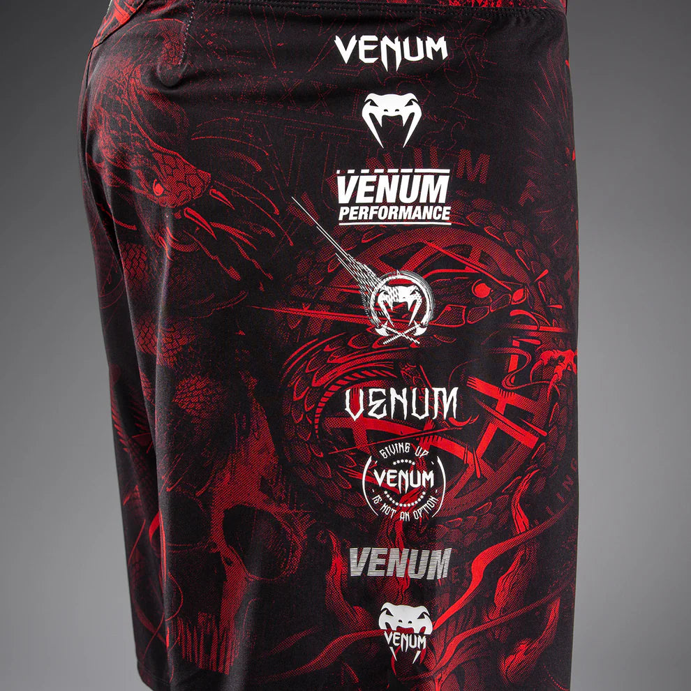 Venum 20th Anniversary graphic detail close-up on Black Red fight shorts