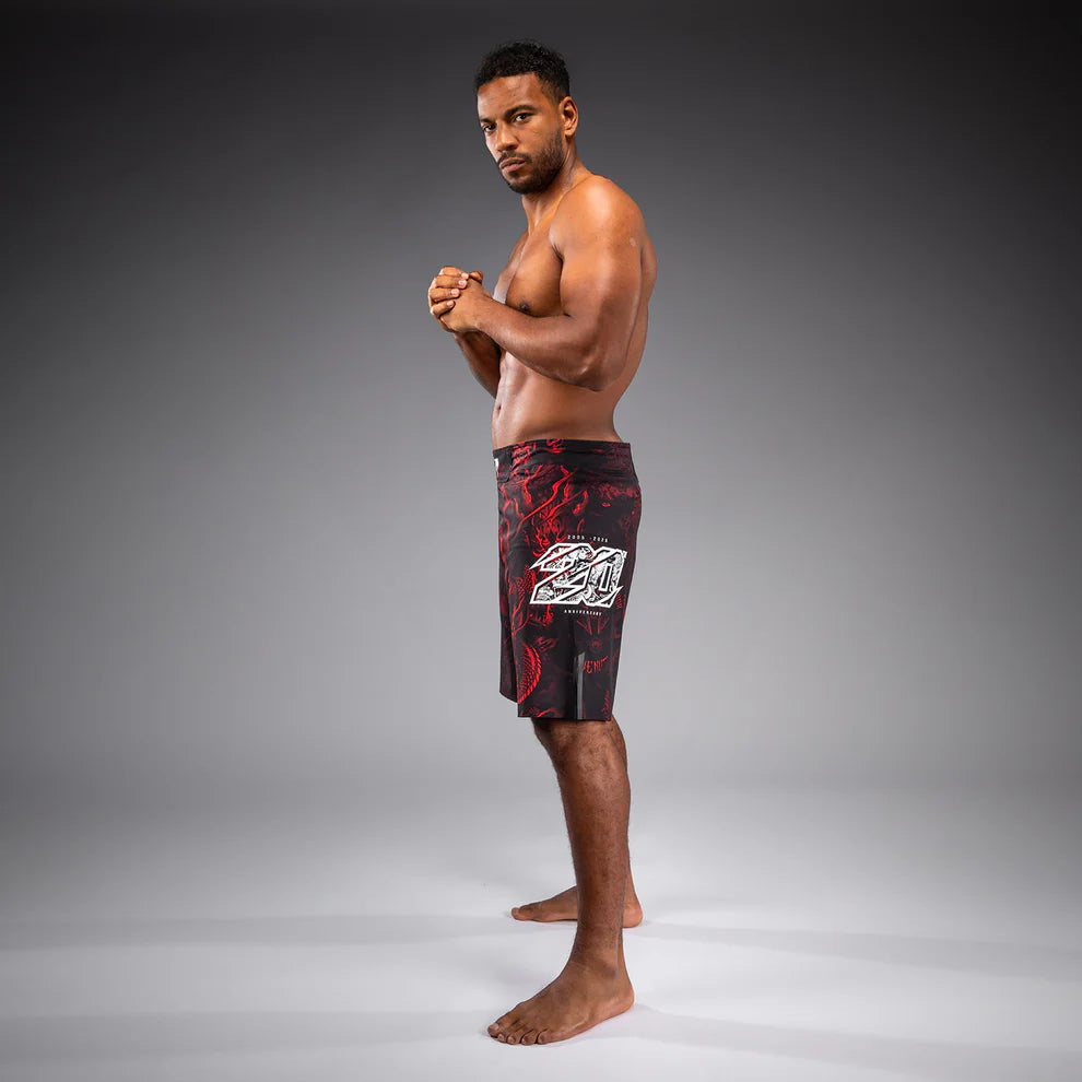 Side view of Venum 20th Anniversary Fightshorts Black Red showing fight shorts profile