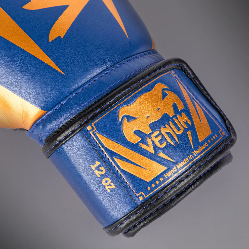 Handcrafted in Thailand Venum Elite boxing gloves made with durable Skintex leather.