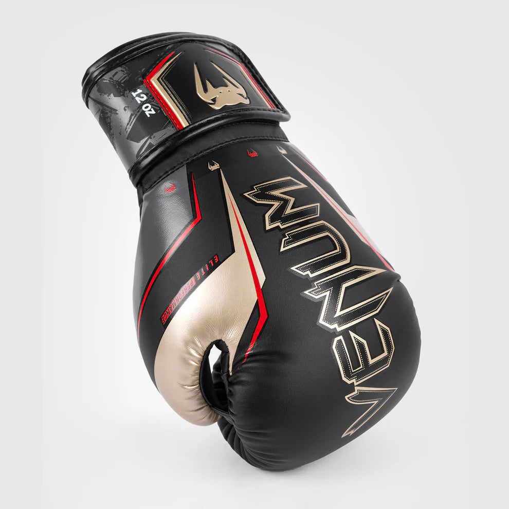 Durable Venum Elite Evo boxing gloves with reinforced seams and secure wrist strap.
