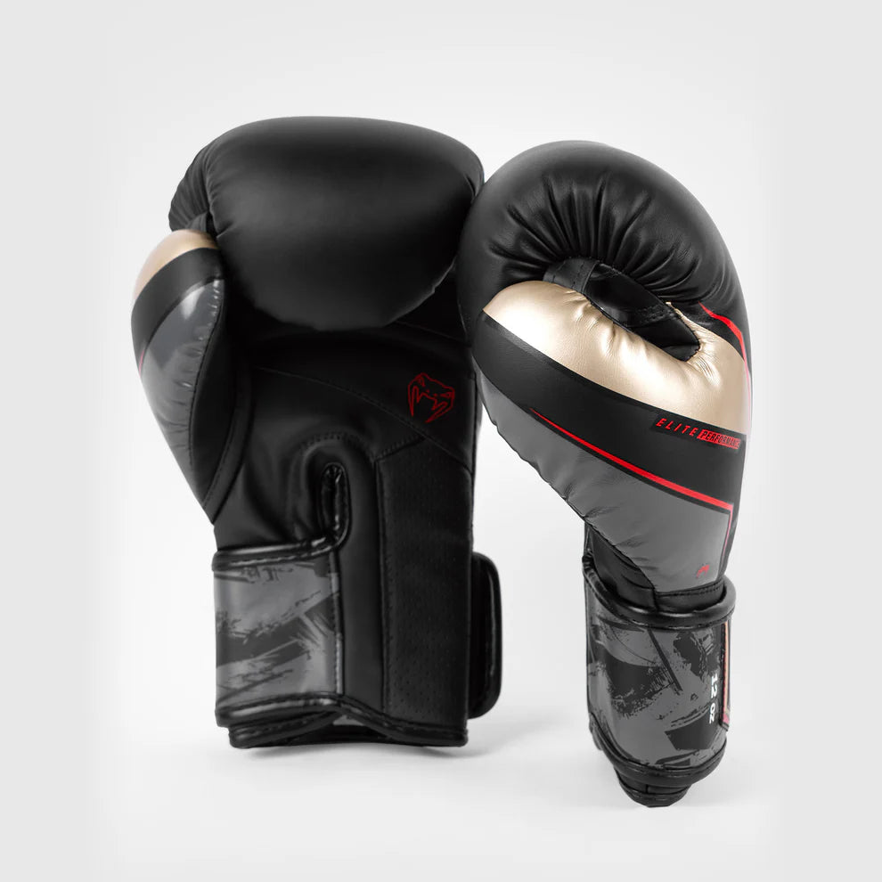 Venum Elite Evo boxing gloves with wide Velcro strap and long cuff for wrist support and stability