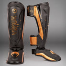 Professional MMA shin pads Venum Elite Evo with ergonomic lightweight design.