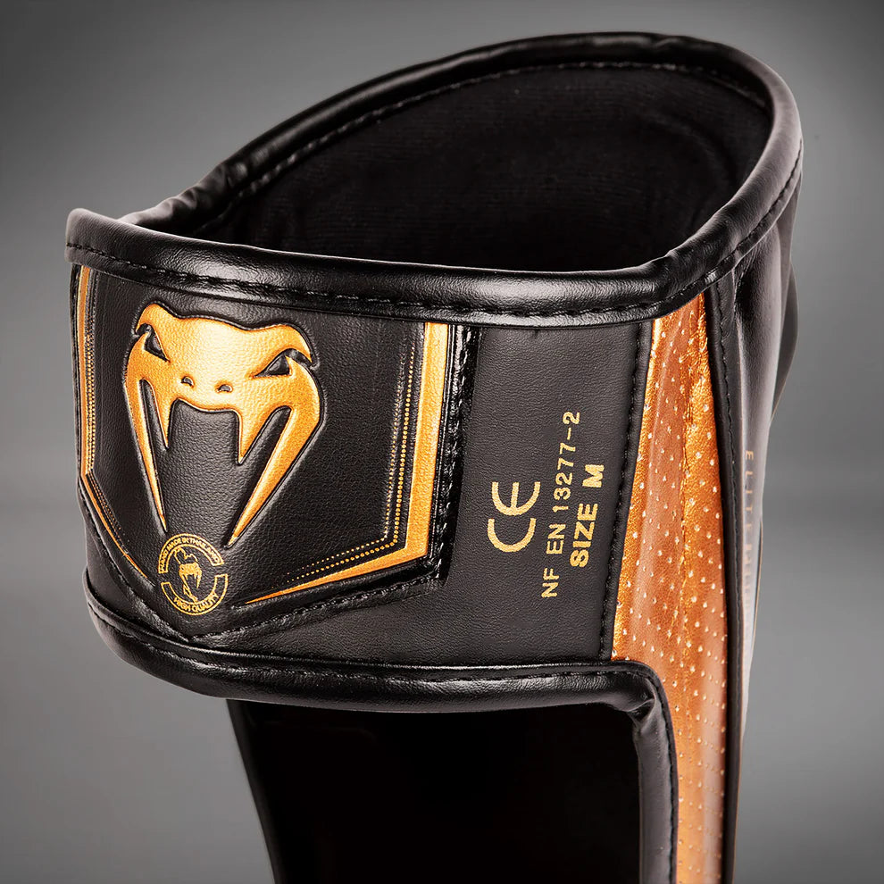 Venum Elite Evo shin pads for sparring, pad work, and combat sports training.
