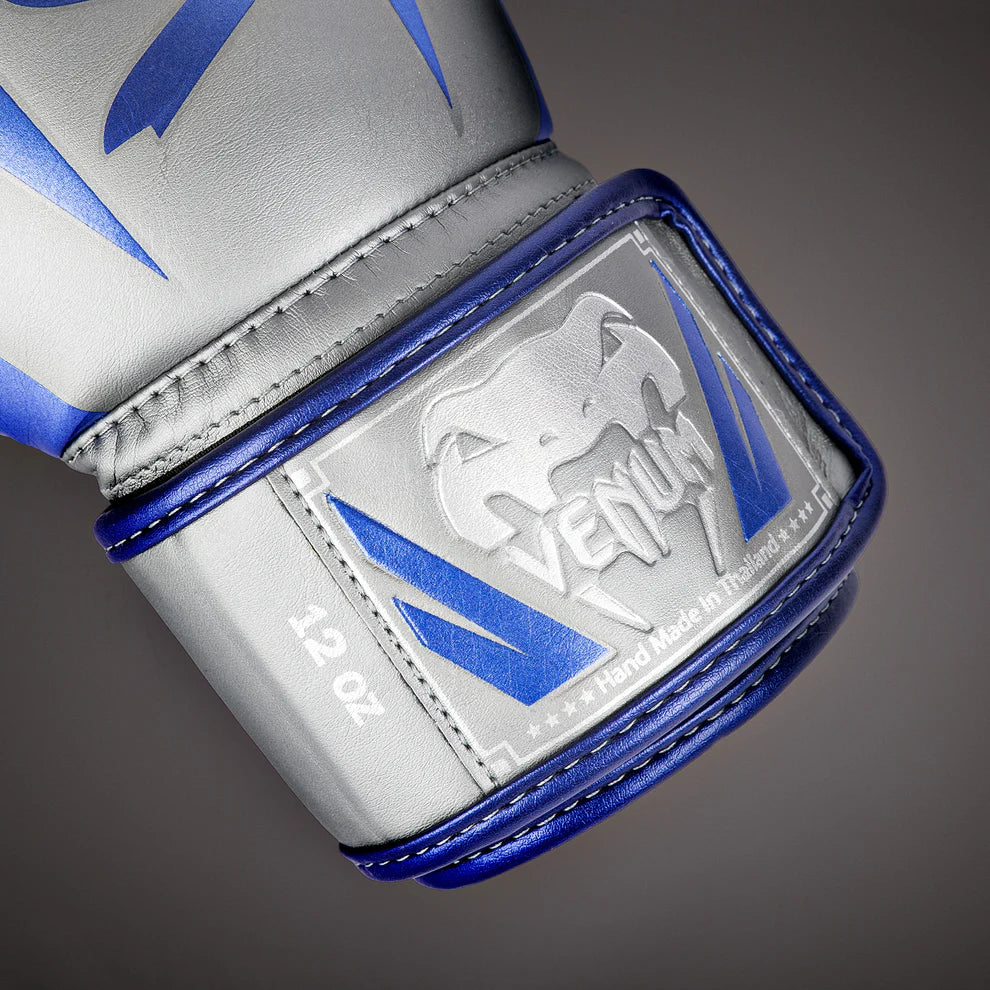 Handcrafted in Thailand Venum Elite boxing gloves with premium semi-leather build.