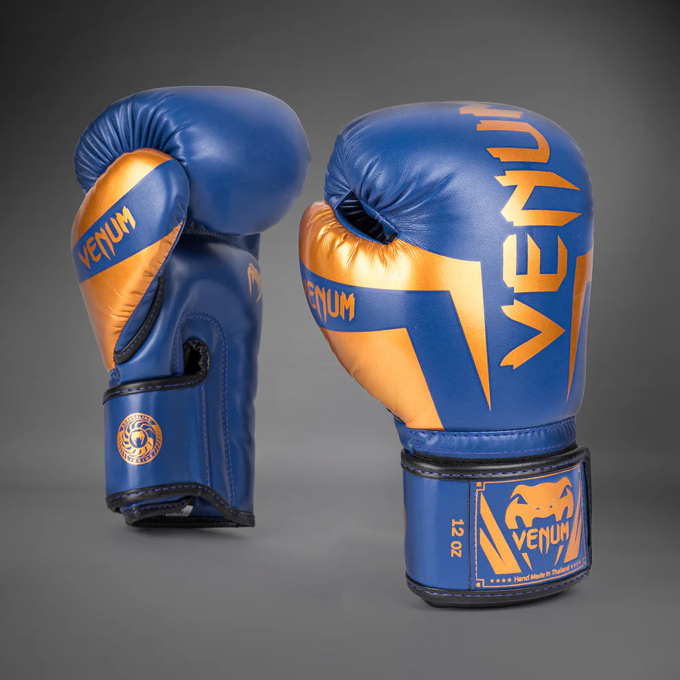 Venum Elite gloves with triple-density foam for superior shock absorption and hand protection.