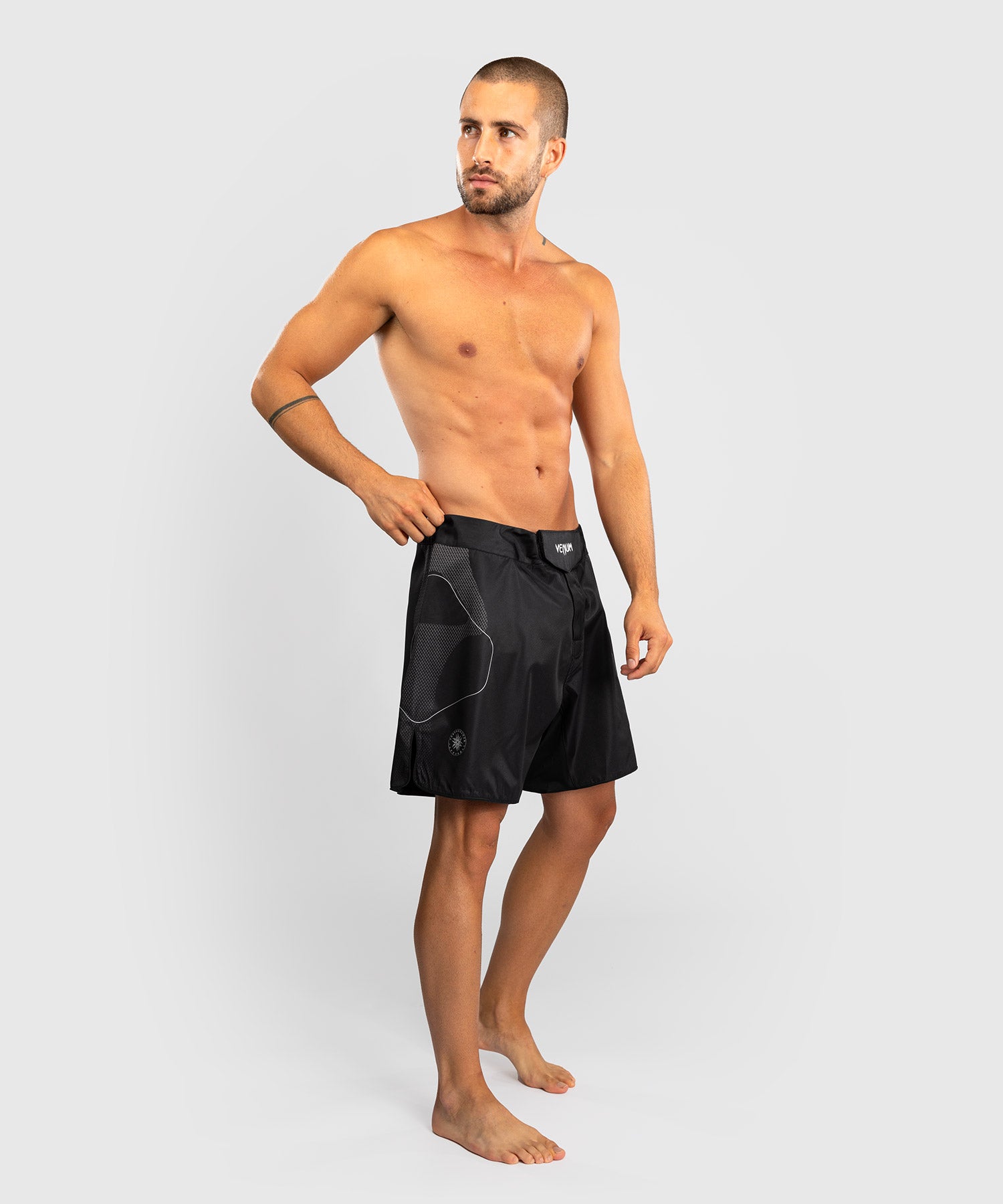 Venum Nexus fight shorts Black Silver left side showing side slit