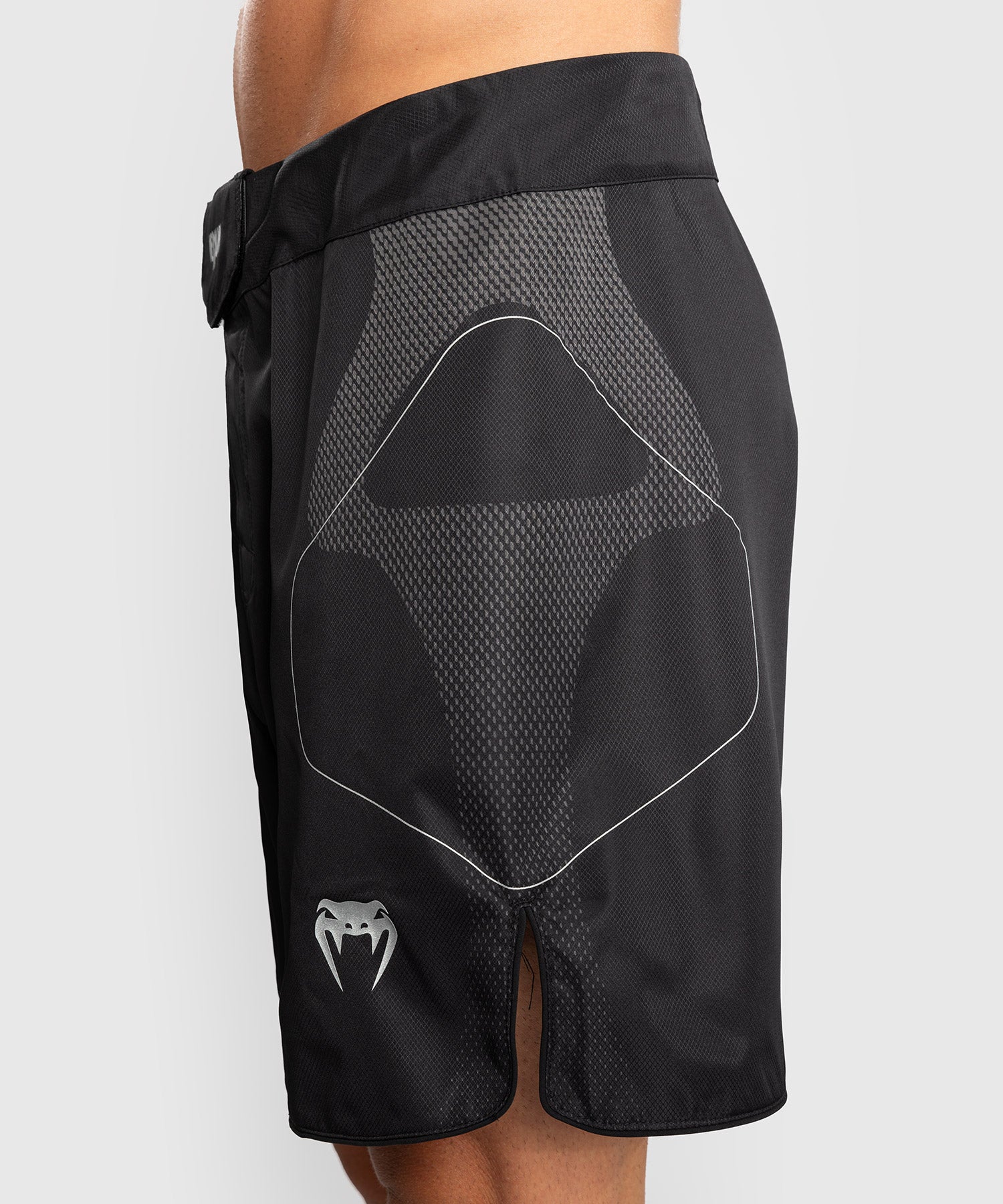 Venum Nexus fight shorts Black Silver logo and sublimated pattern detail