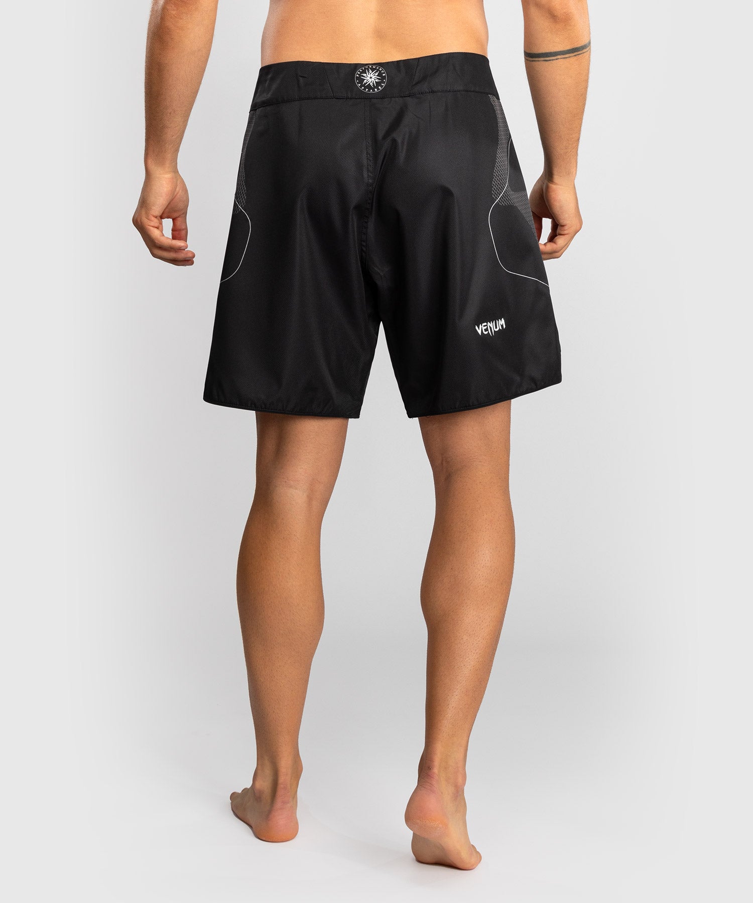 Close-up of Venum Nexus fight shorts hook and loop waistband closure