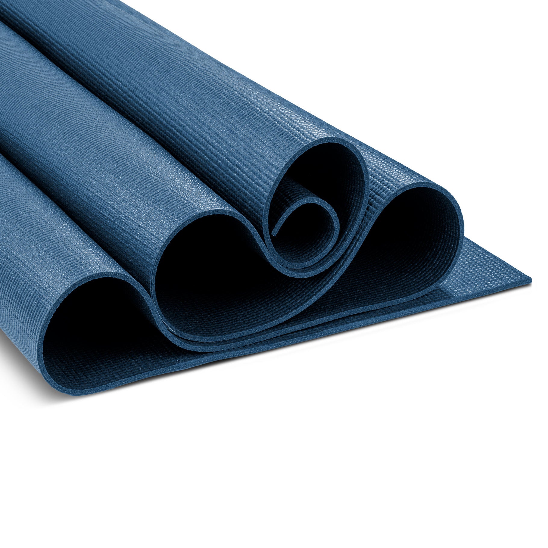 Close-up of the non-slip grip texture on the Warrior II dark blue yoga mat for stable practice and enhanced traction.