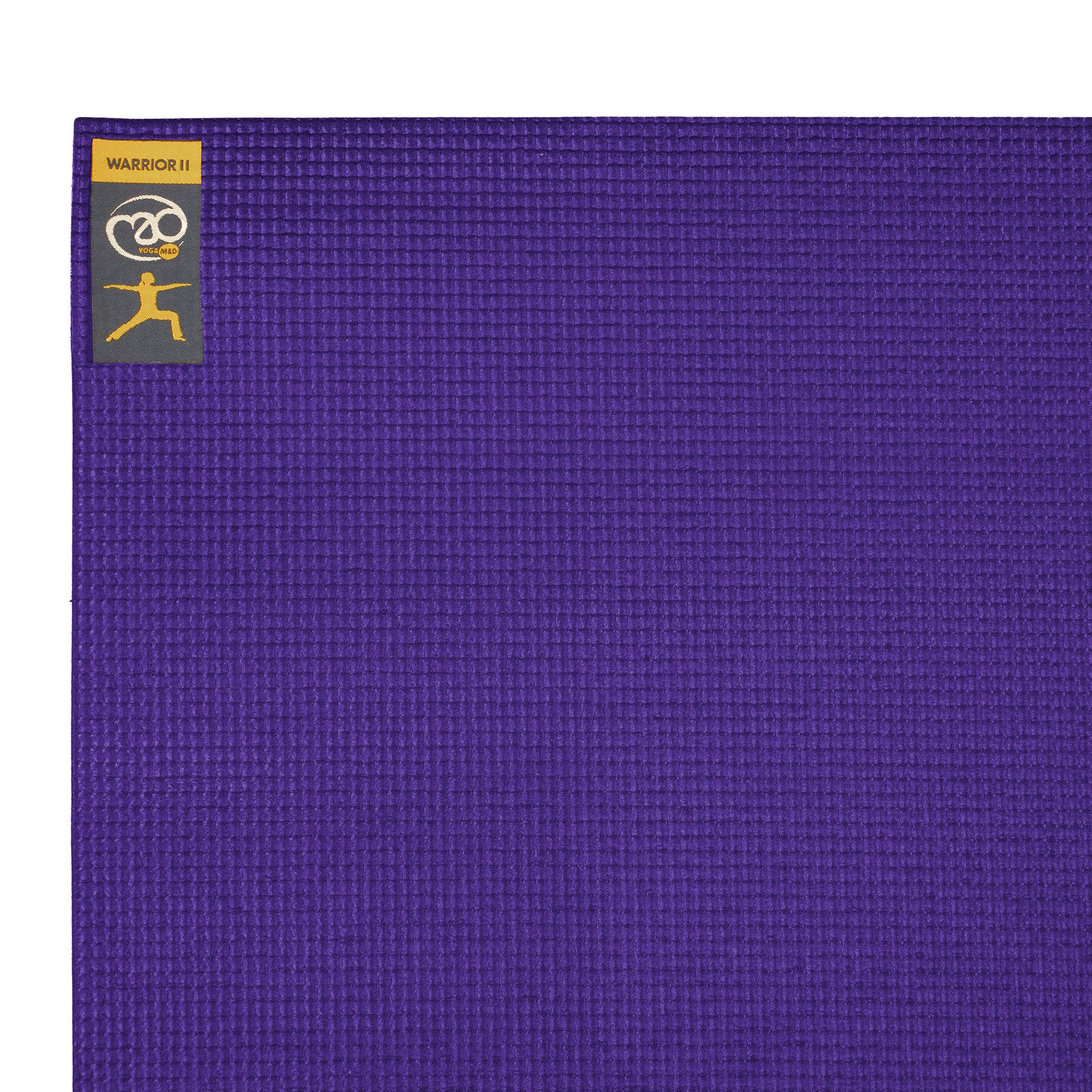 Rolled-up Warrior II Yoga Mat in purple, lightweight and easy to carry for yoga classes or travel.