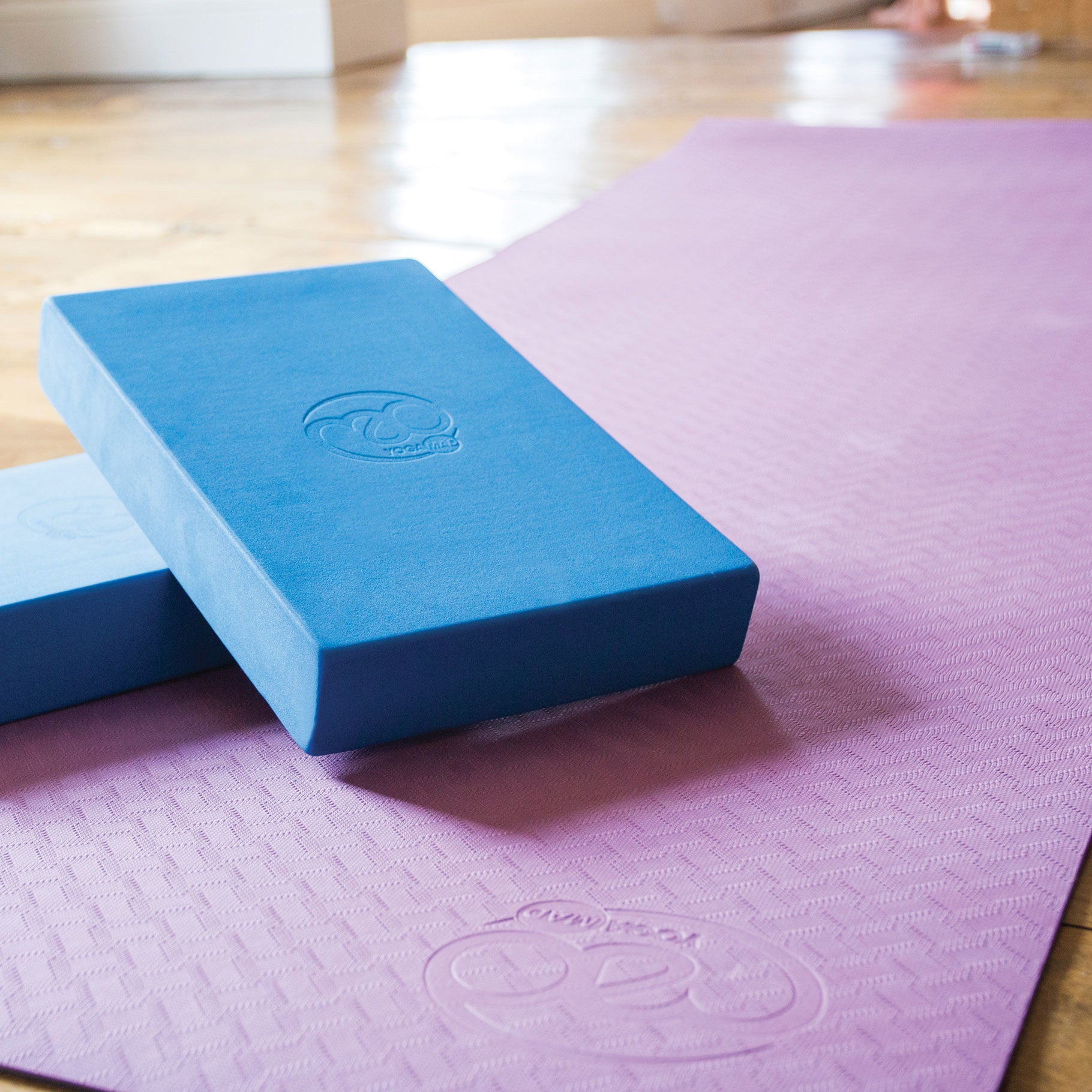 Close-up of EVA foam texture on Yoga-Mad black yoga block showing scratch-resistant finish.