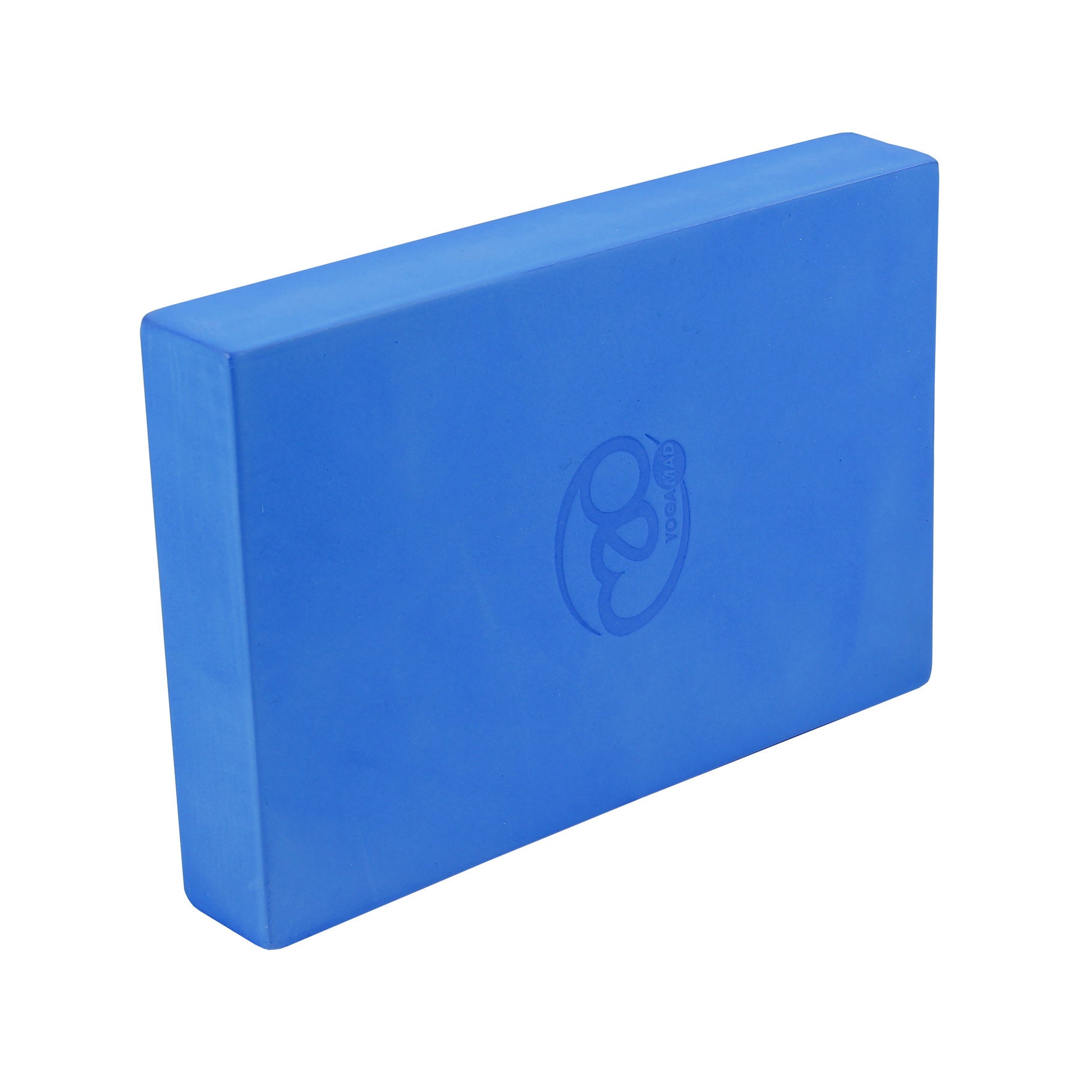 Yogi using Yoga-Mad Full Yoga Block blue for balance and alignment during seated yoga pose.