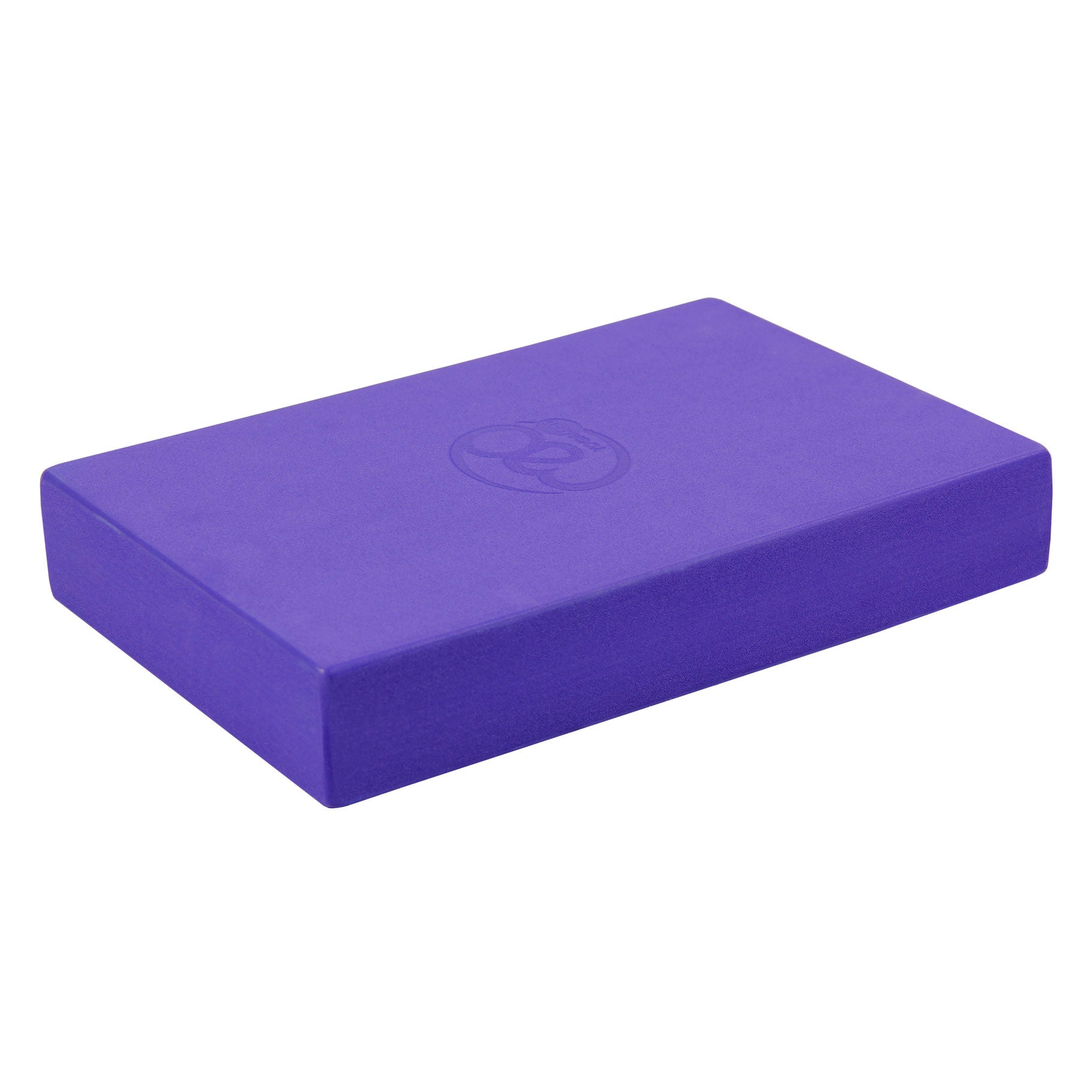 Angled view of purple Yoga-Mad yoga block showing chamfered edges and soft surface texture for comfort.