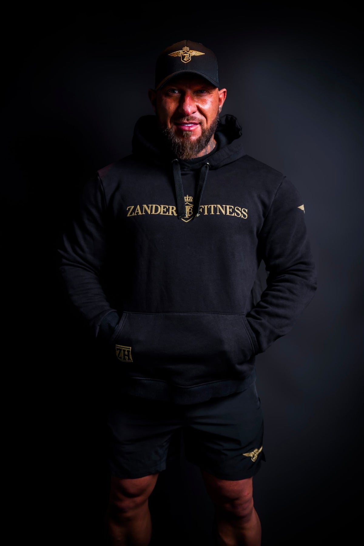 Model wearing the Zander Training Hoodie during a boxing warm-up session