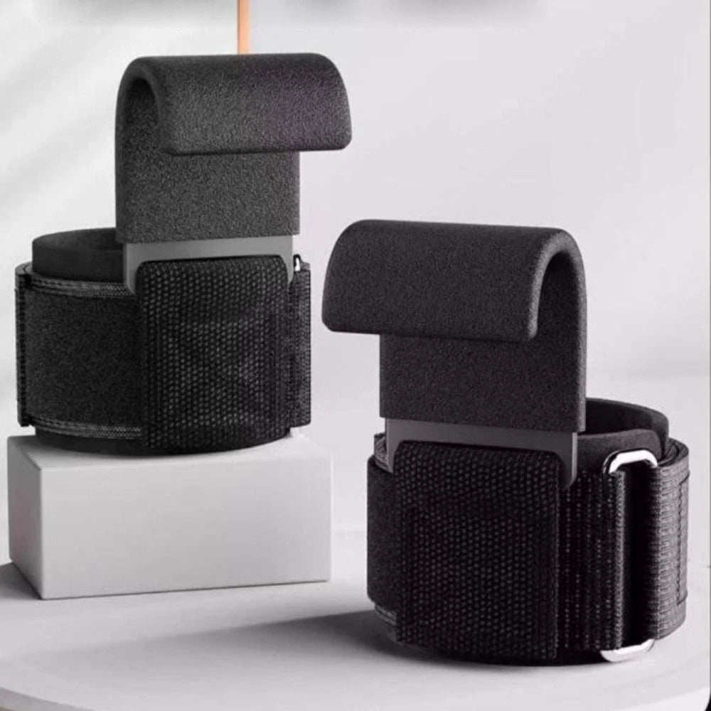 Pair of weight lifting hooks with wrist straps on white background